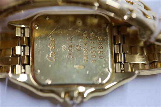 A ladys modern 18ct gold and diamond Cartier Panthere quartz wrist watch,